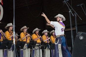The World Famous Cowboy Band on stage performing.